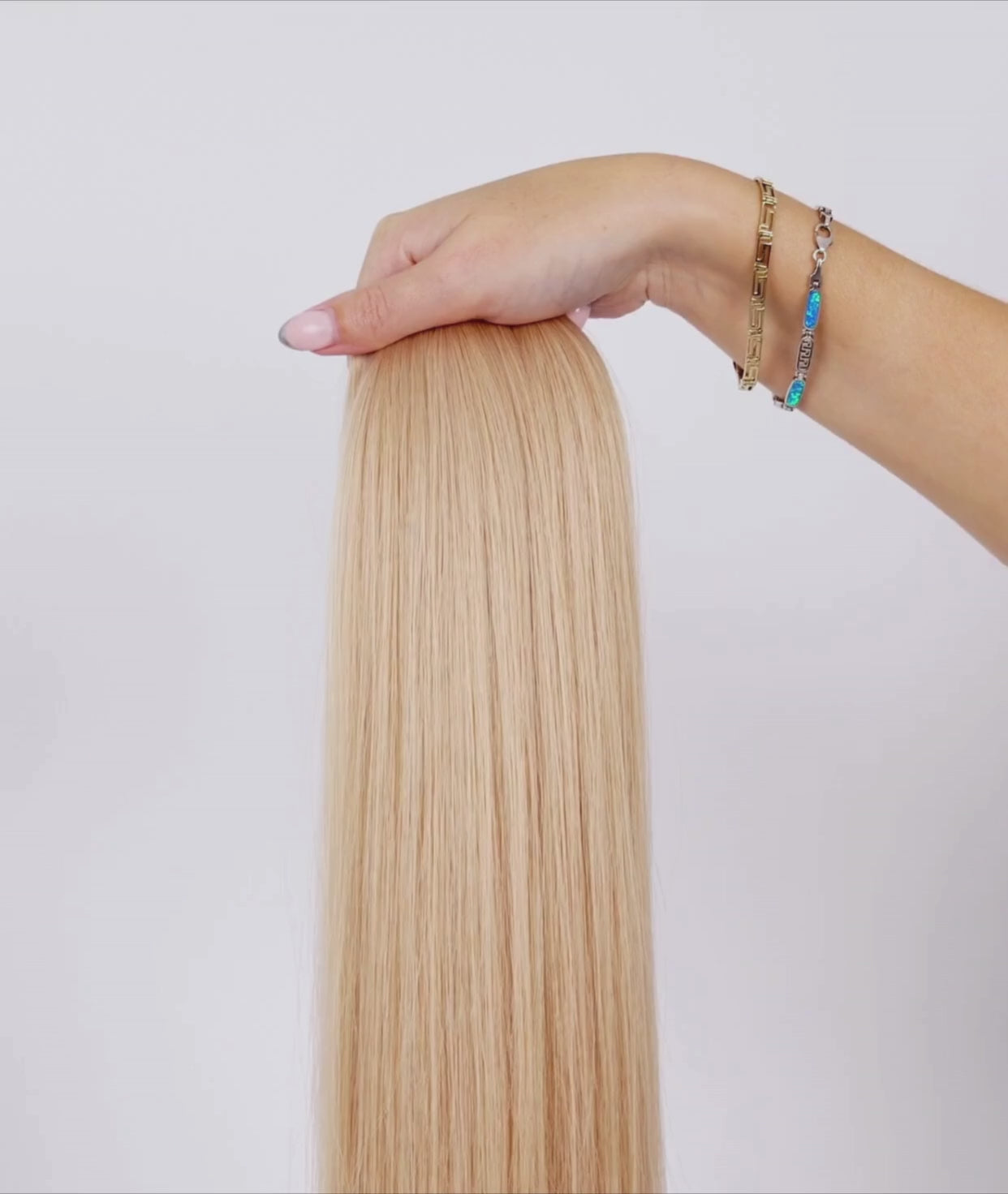 Load video: #Beach Blonde Ultra Seamless Tape In Hair Extensions