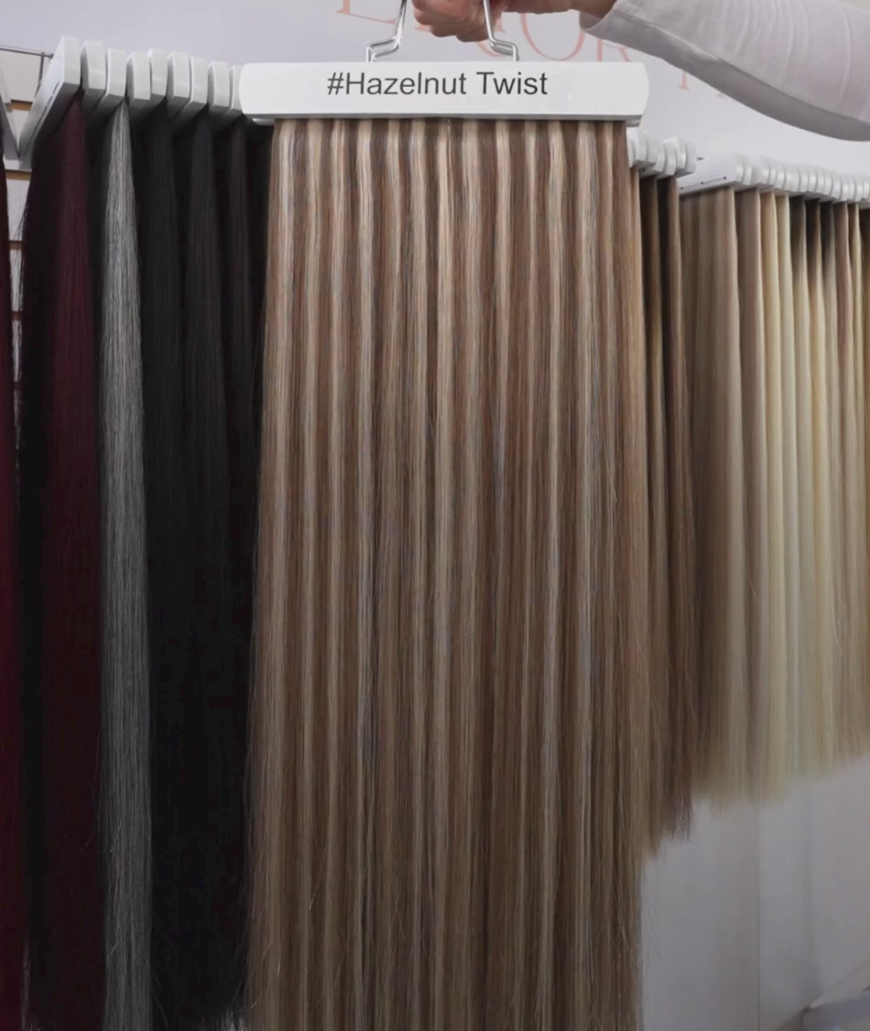 Load video: #Hazelnut Twist Ultra Seamless Tape In Hair Extensions