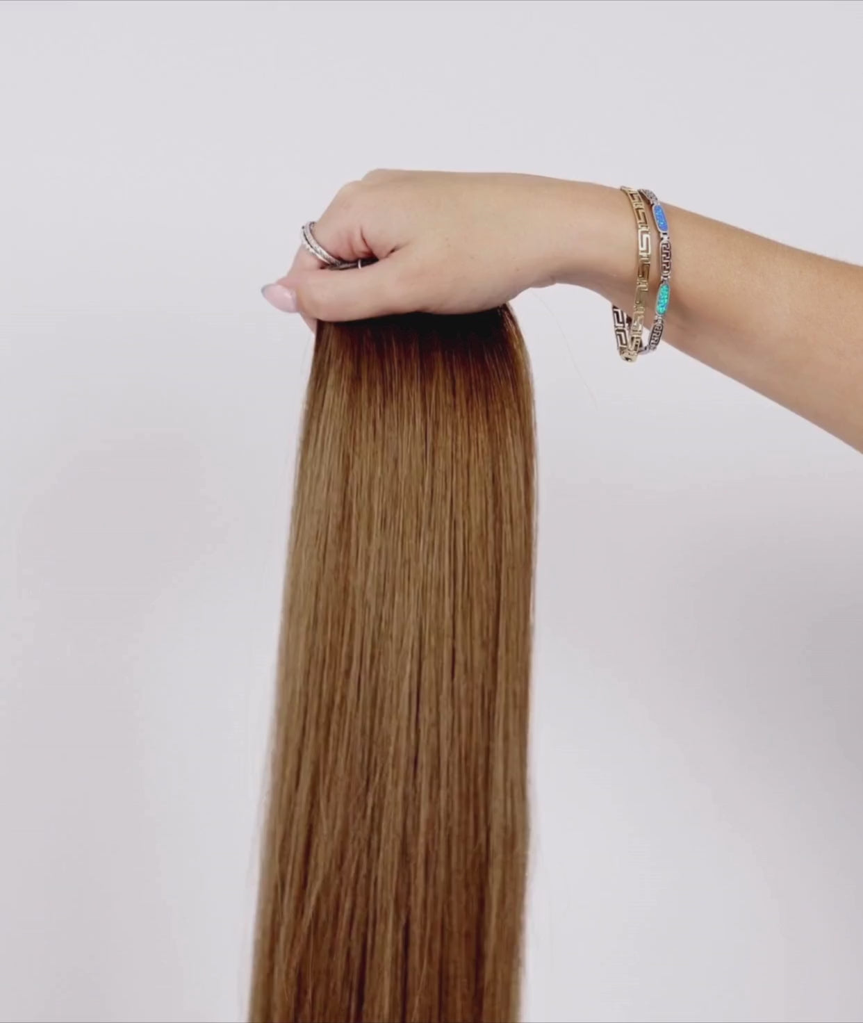 Load video: #Dubai Ultra Seamless Tape In Hair Extensions (NEW)