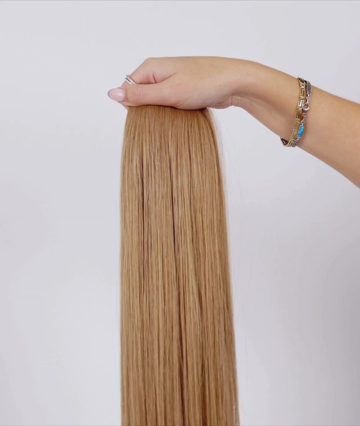 Load video: #Sunkissed Blonde Ultra Seamless Tape In Extensions (NEW)