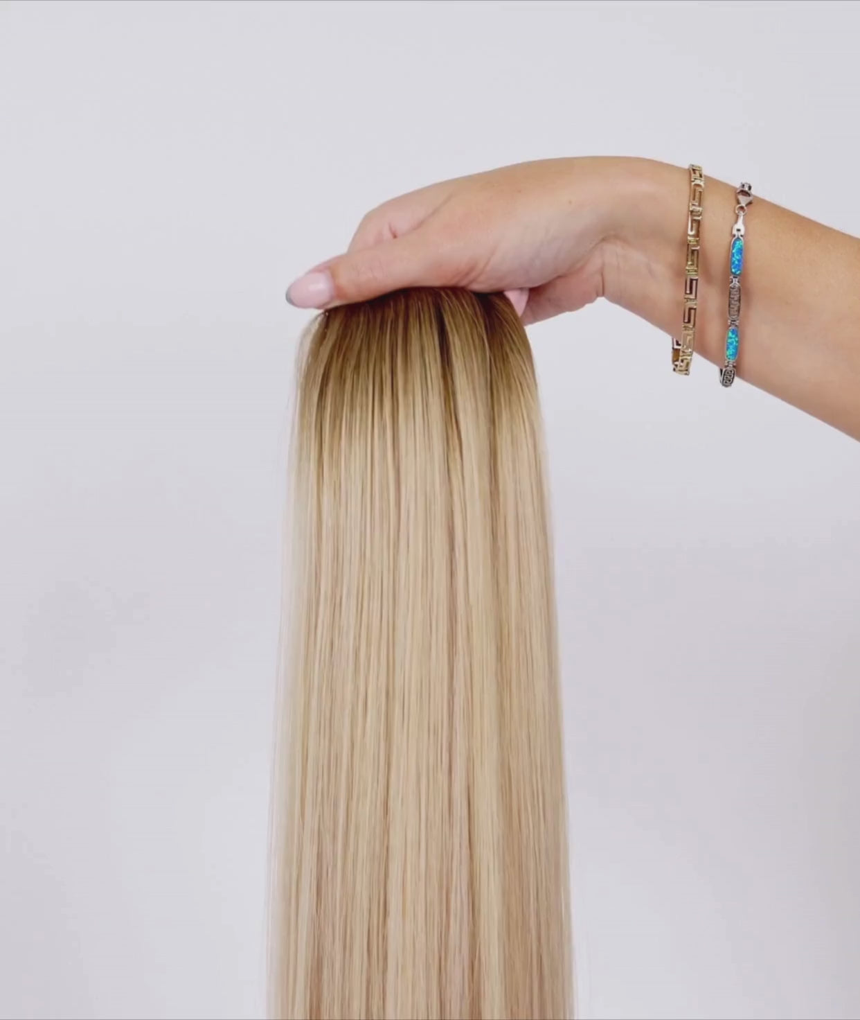 Load video: #Rooted The Blonde Ultra Seamless Tape In Hair Extensions (NEW)