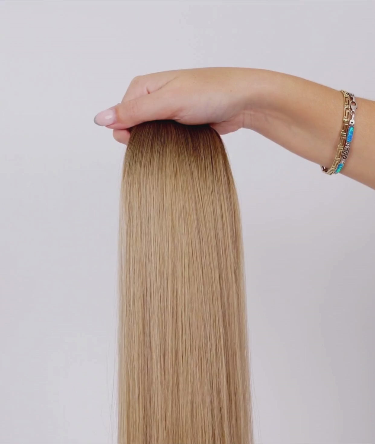 Load video: #Rooted Champagne Chestnut Ultra Seamless Tape In Hair Extensions (NEW)
