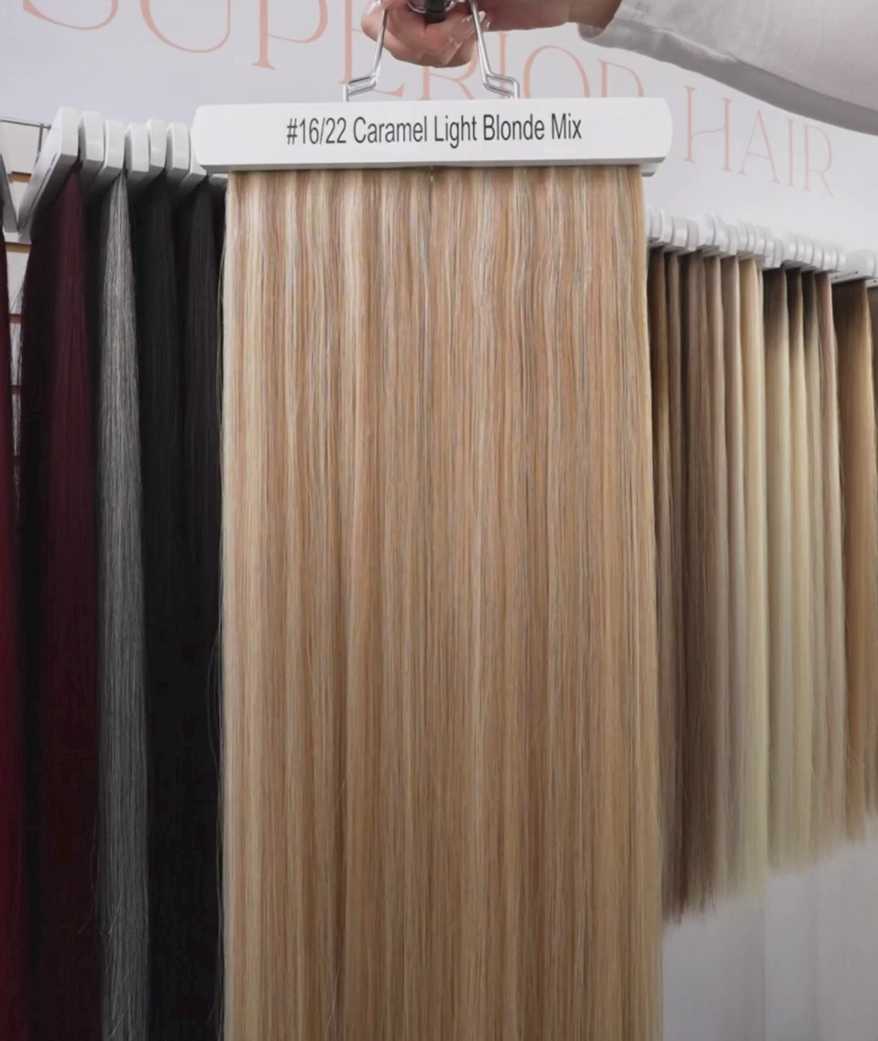 Load video: #16/22 Caramel Light Blonde Mix Butterfly Weft™ Hair Extensions