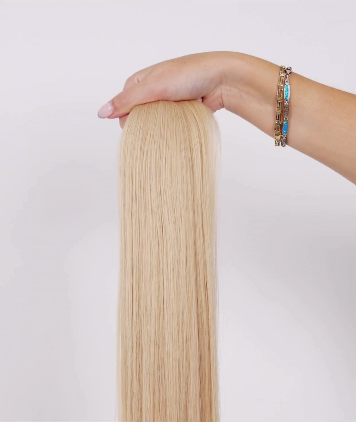 Load video: #Beach Ash Blonde Ultra Seamless Tape In Extensions (NEW)