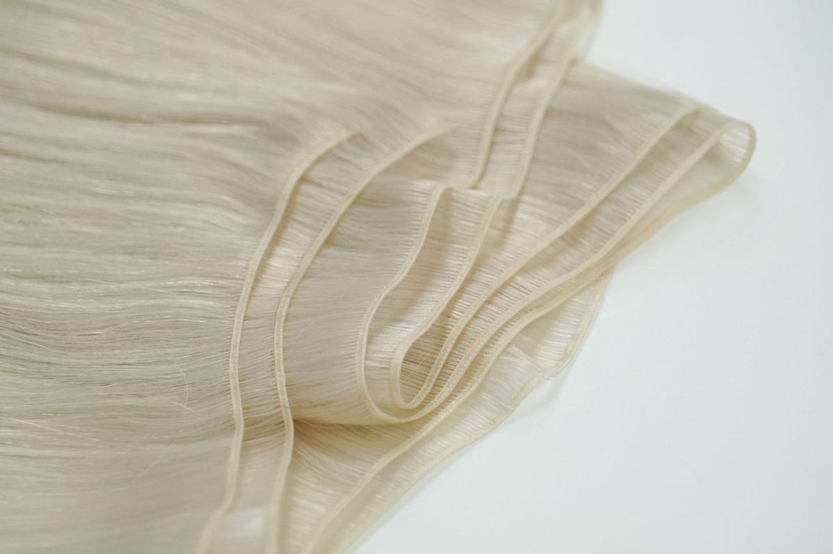 #60 Whitest Ash Blonde Genius Weft Extensions